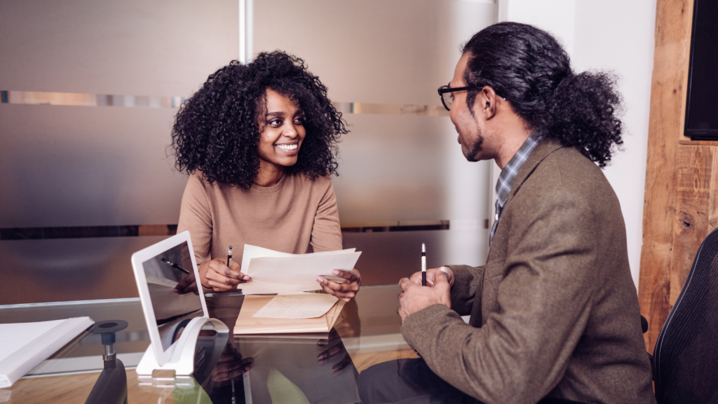 Woman interviewing man